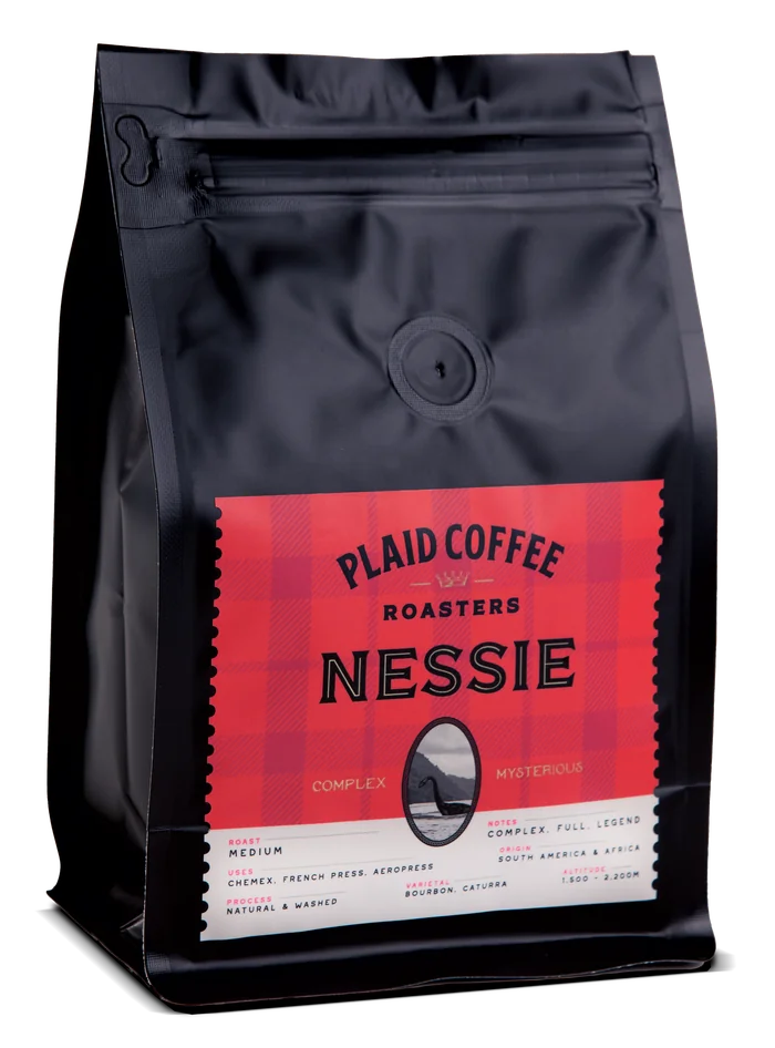 Plaid Coffee Nessie medium roast bag, matte black with a red label