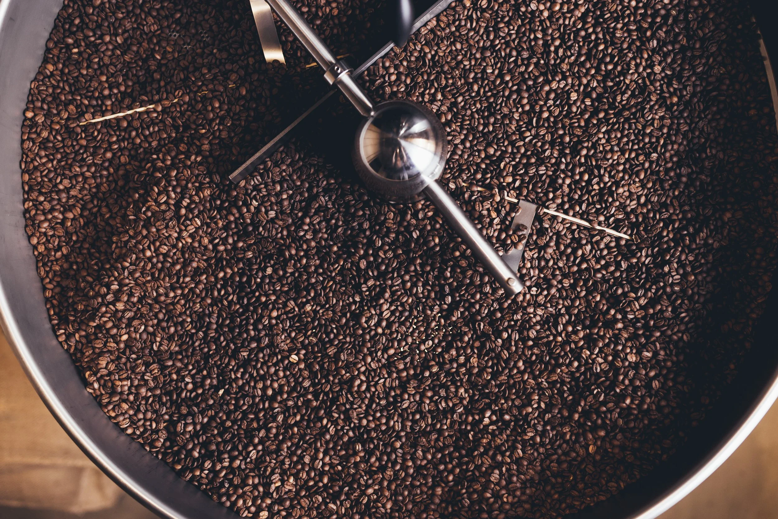The drum of a small-batch coffee roaster mid-cycle